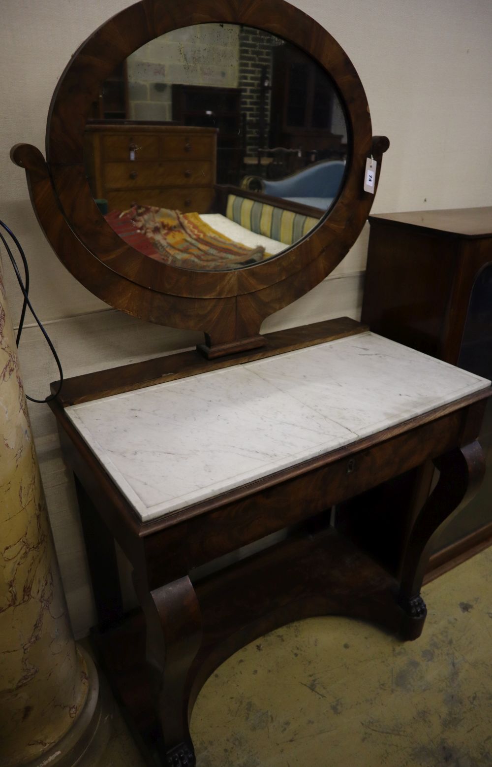An Empire style dressing table, width 79cm, depth 45cm, height 145cm